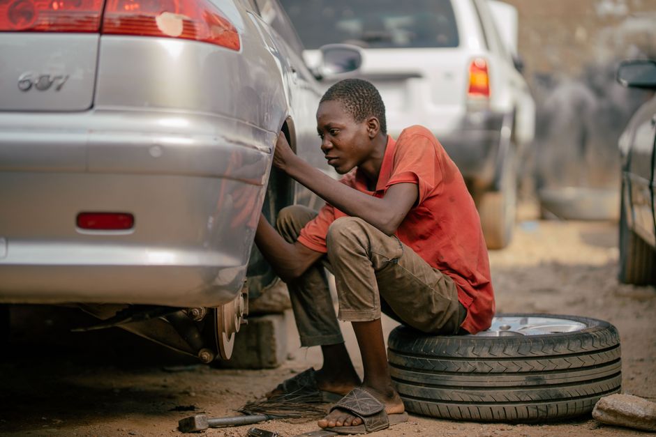 Mechanic performing a professional tire installation